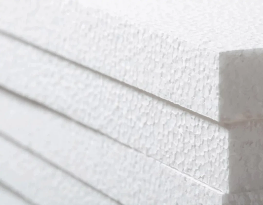 Superficie con textura de poliuretano esparcido para aislamiento térmico en industrias, material de sellado continuo y alta eficiencia energética.